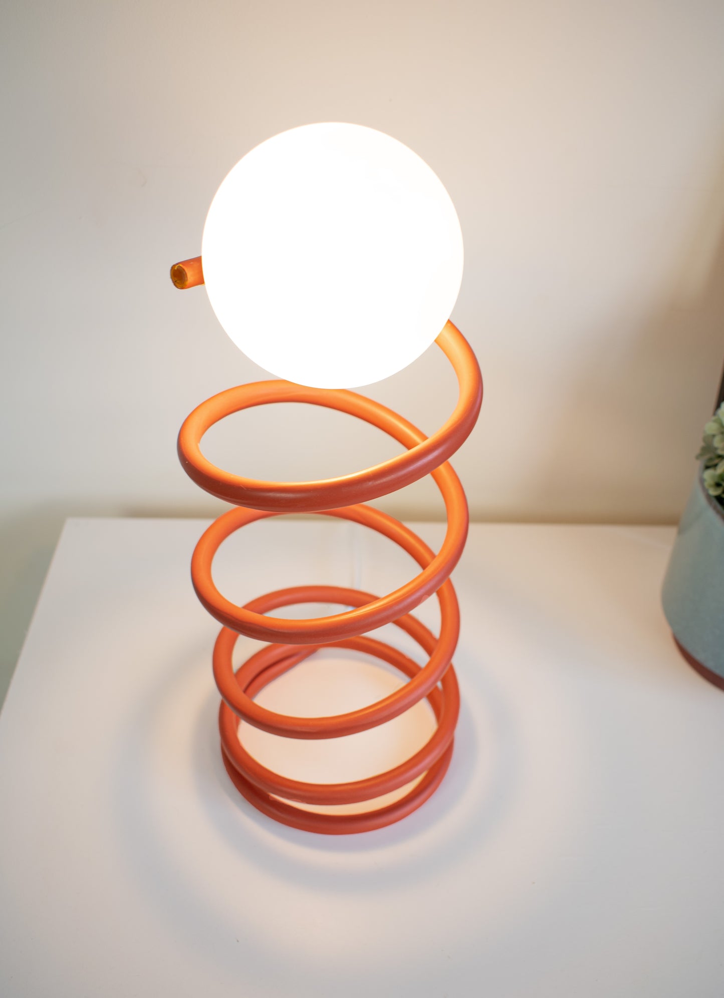 Unique Round Spring Table Lamp in Red Colour
