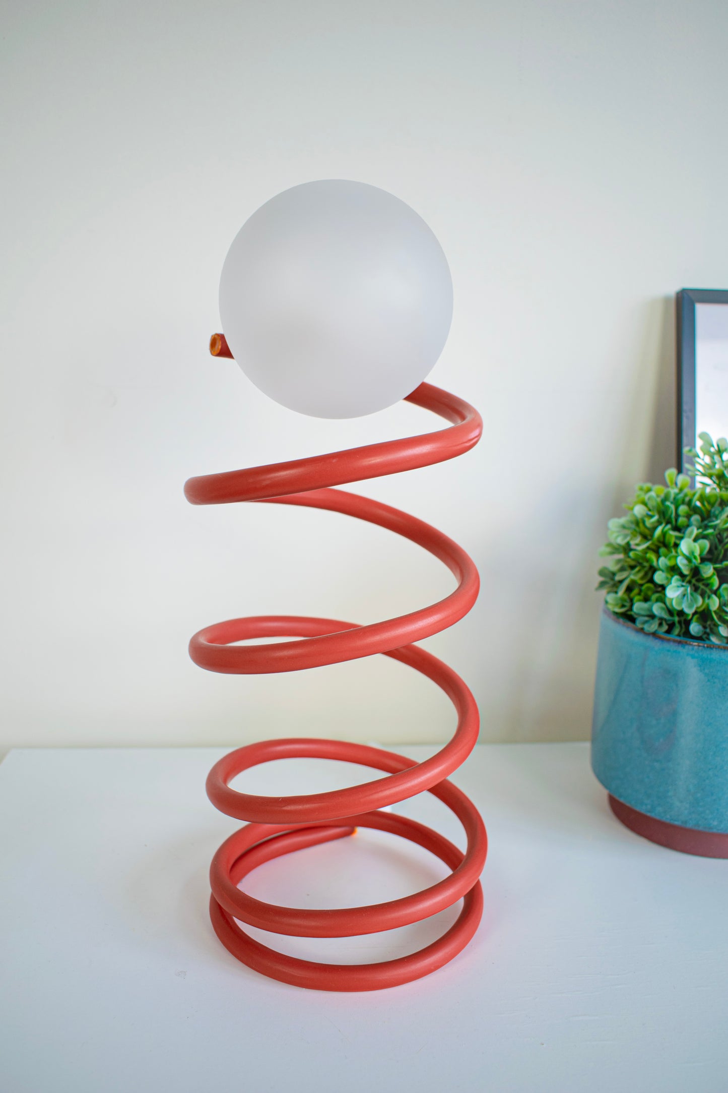 Unique Round Spring Table Lamp in Red Colour