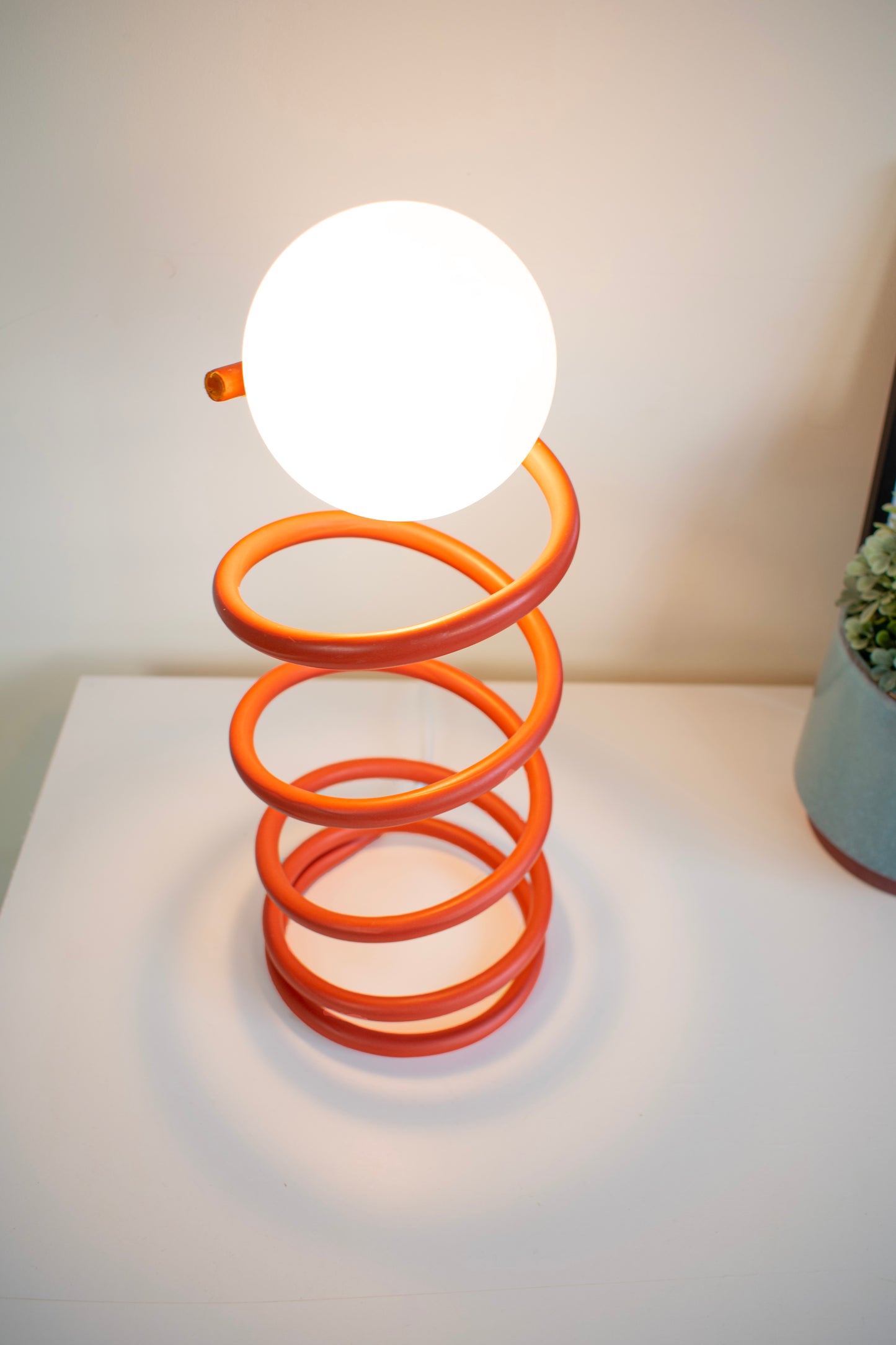 Unique Round Spring Table Lamp in Red Colour